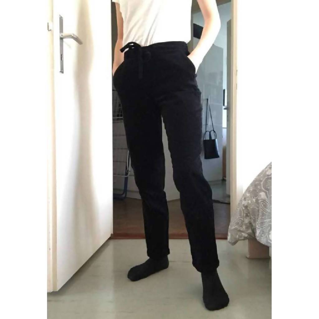 Black ribbed trousers