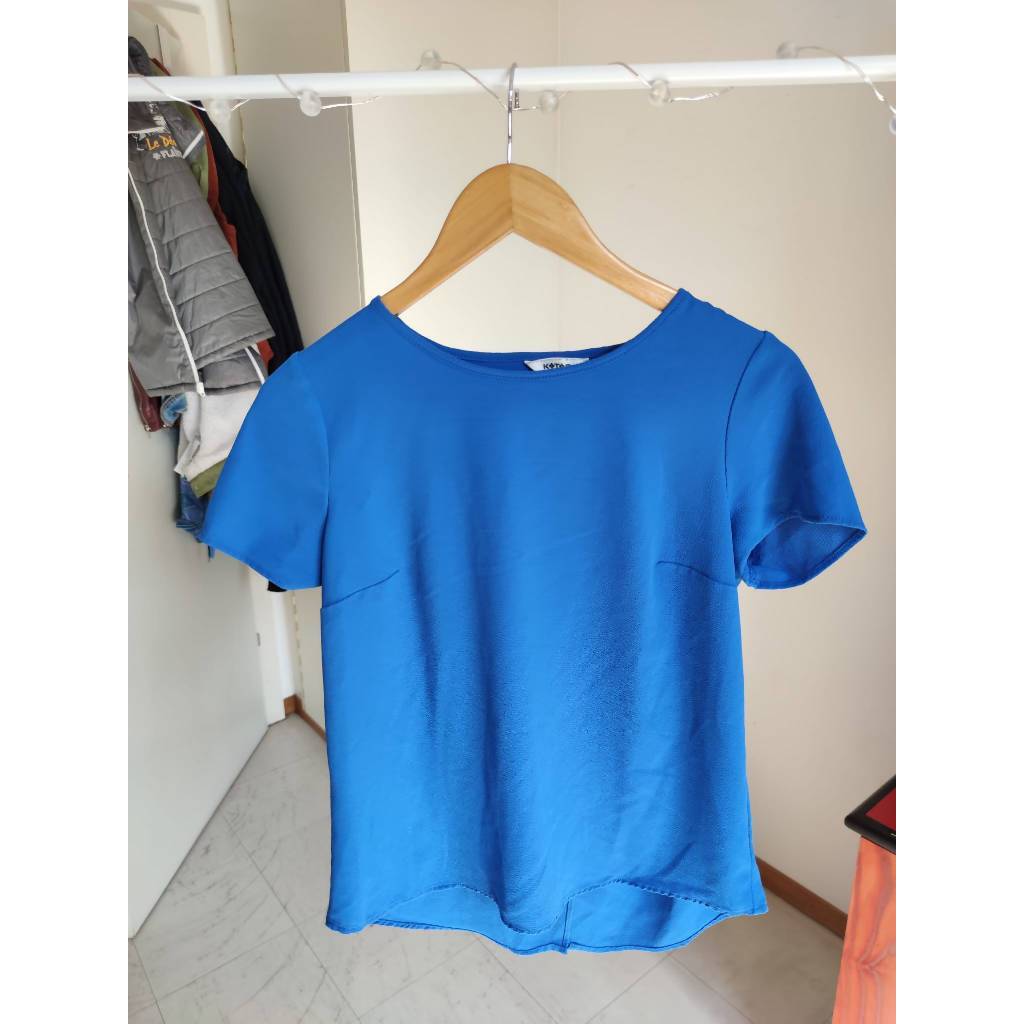 Blue top with slit at the back