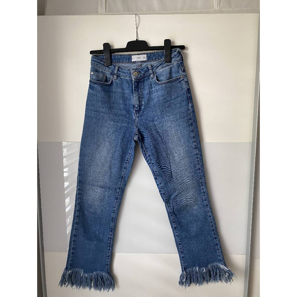 Straight jeans with fringes